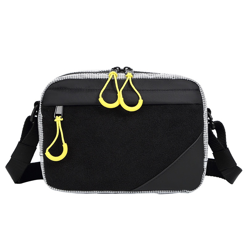 Sleek Black Crossbody Bag with Bright Yellow Zippers