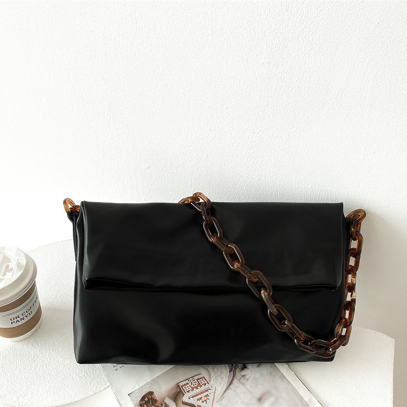 Chic Black Shoulder Bag with Tortoiseshell Chain