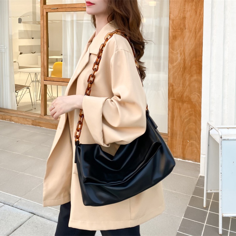 Chic Black Shoulder Bag with Tortoiseshell Chain