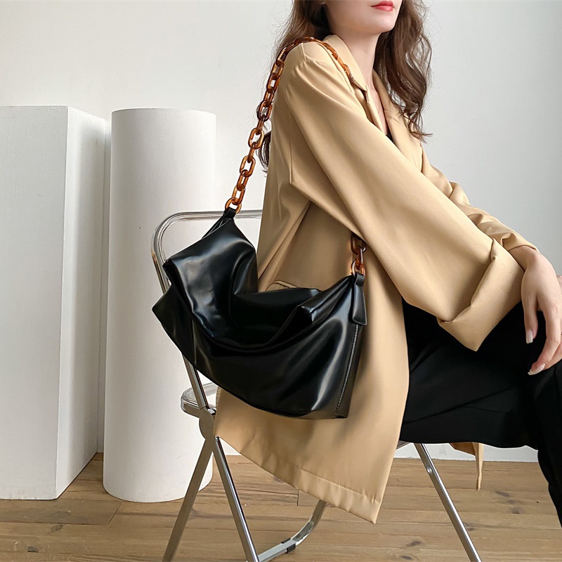 Chic Black Shoulder Bag with Tortoiseshell Chain