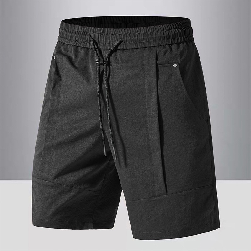 Pantalones cortos urbanos de secado rápido para hombre.