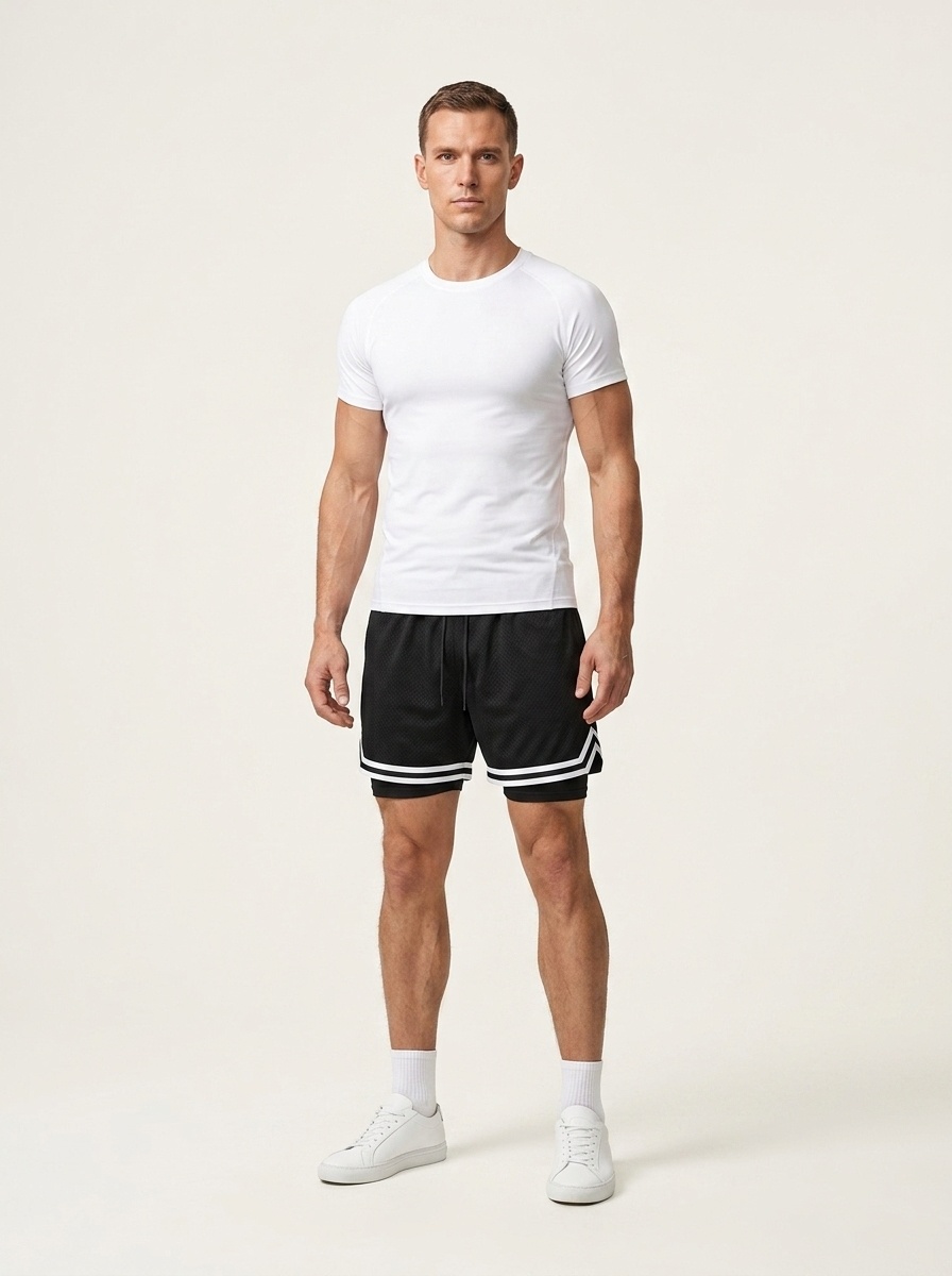 Pantalones cortos de baloncesto de malla para hombre con forro y bolsillos.