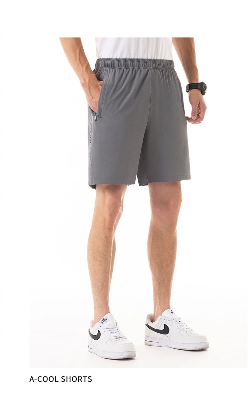 Pantalones cortos deportivos de secado rápido para hombre con bolsillos y agujeros láser y agujeros láser