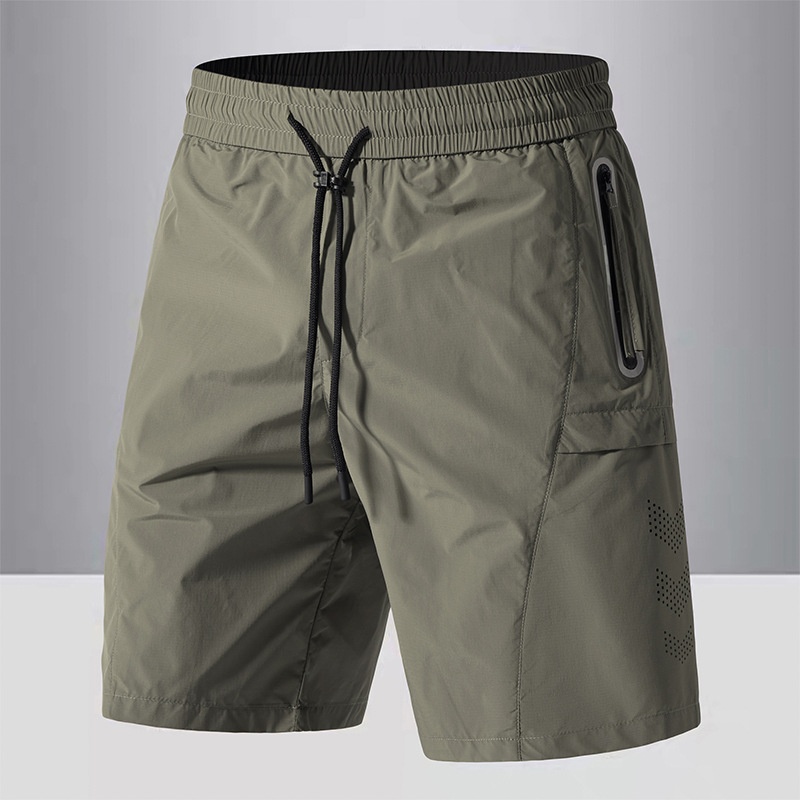 Pantalones cortos deportivos de secado rápido para hombre con bolsillos reflectantes termosellados.