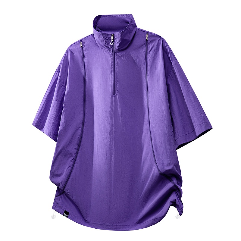 Poncho deportivo unisex ligero con media cremallera.