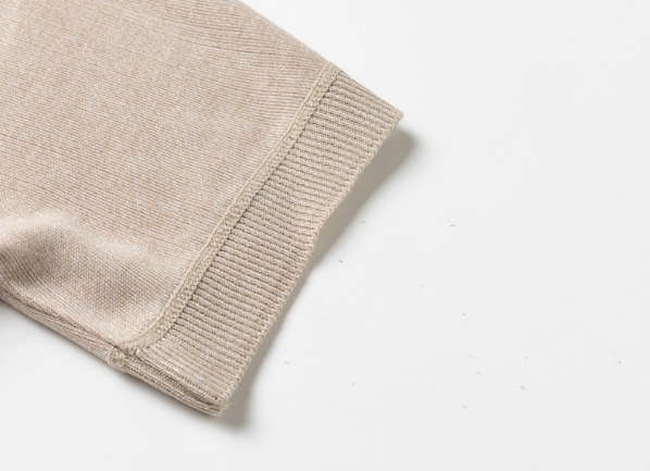 Cárdigan tipo polo de manga corta para hombre, color beige, de punto texturizado.