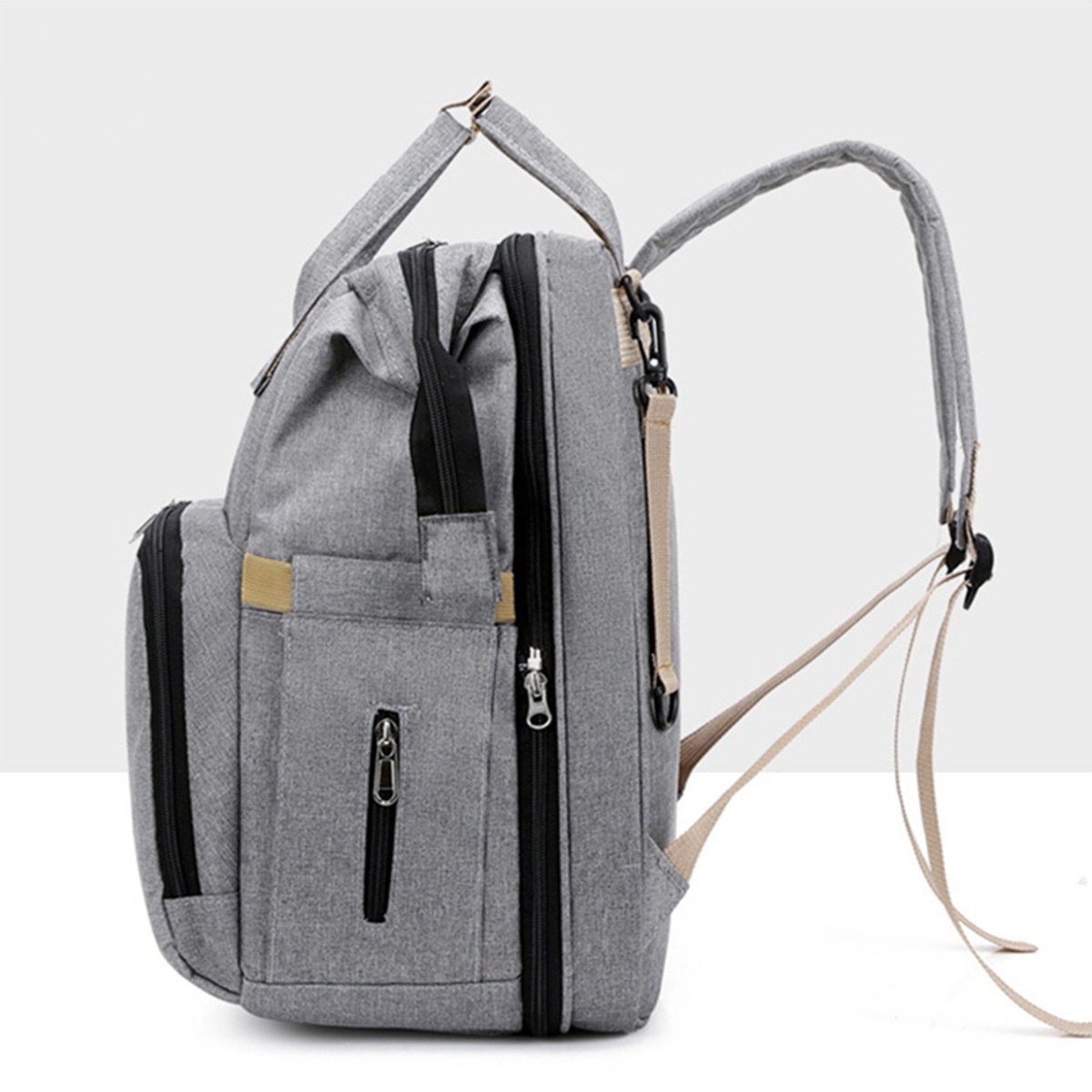 Mochila cambiador 2 en 1 con moisés portátil, cambiador, bolsillos térmicos y puerto de carga USB.