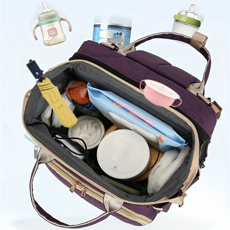 Zaino fasciatoio 2 in 1 con culla portatile, fasciatoio, tasche termiche e porta di ricarica USB.