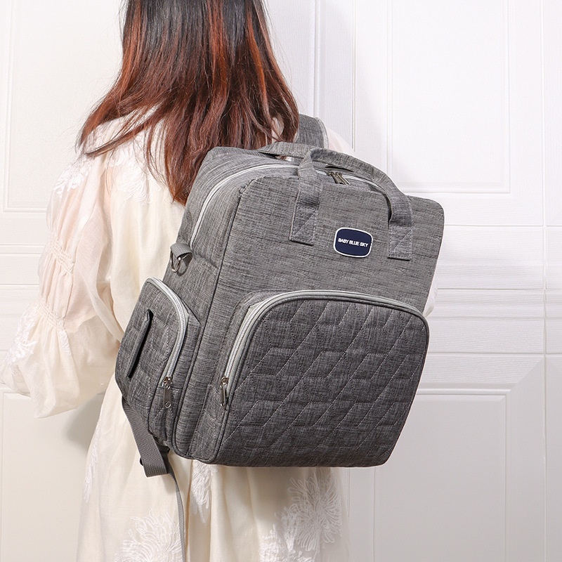 Zaino fasciatoio multifunzionale con fasciatoio pieghevole, borsa da viaggio per neonati in tessuto Oxford impermeabile con tasche termiche.