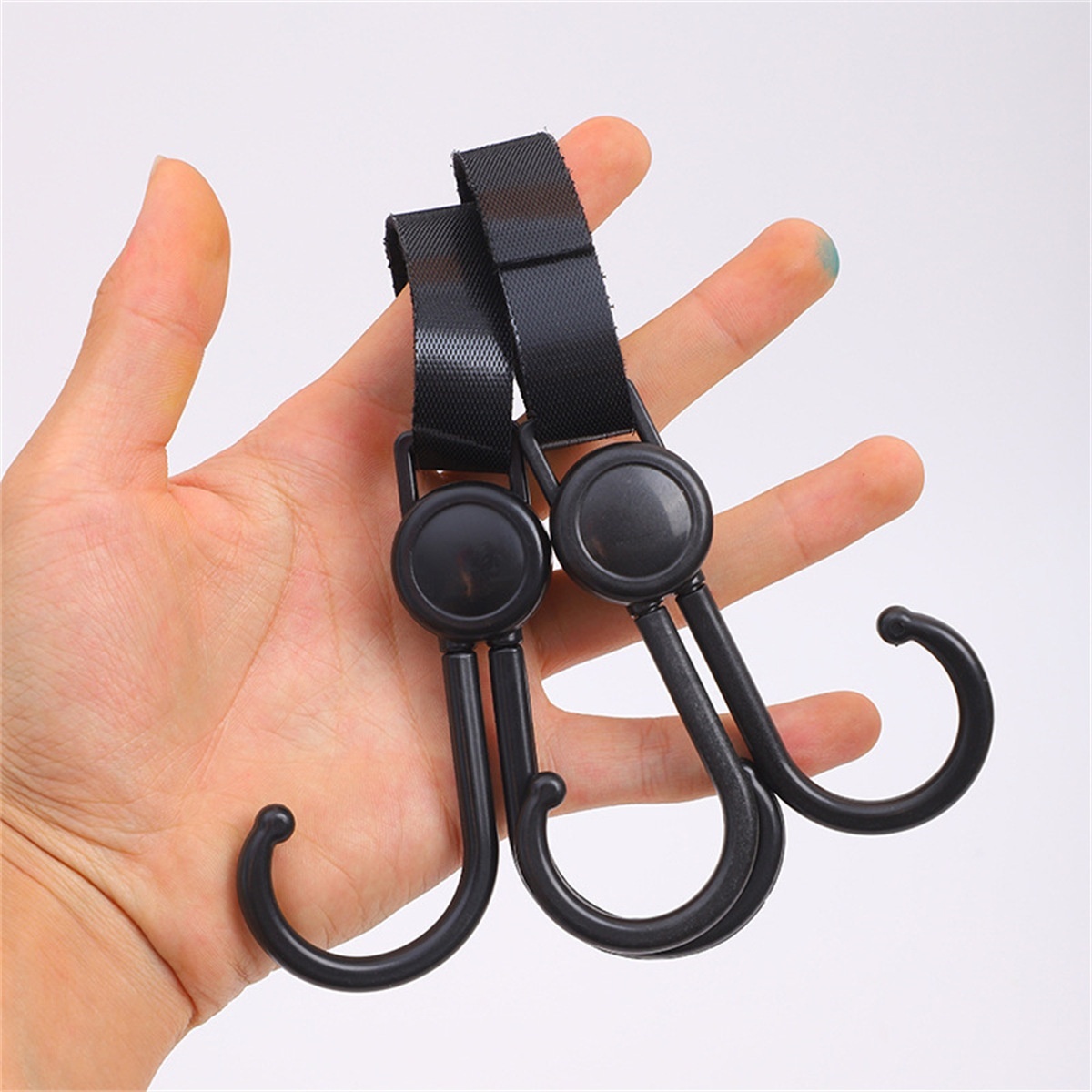 Ganchos universales para cochecito, clips giratorios de 360° de alta resistencia para colgar bolsas, con correas de sujeción ajustables para bolsas de pañales y compras.