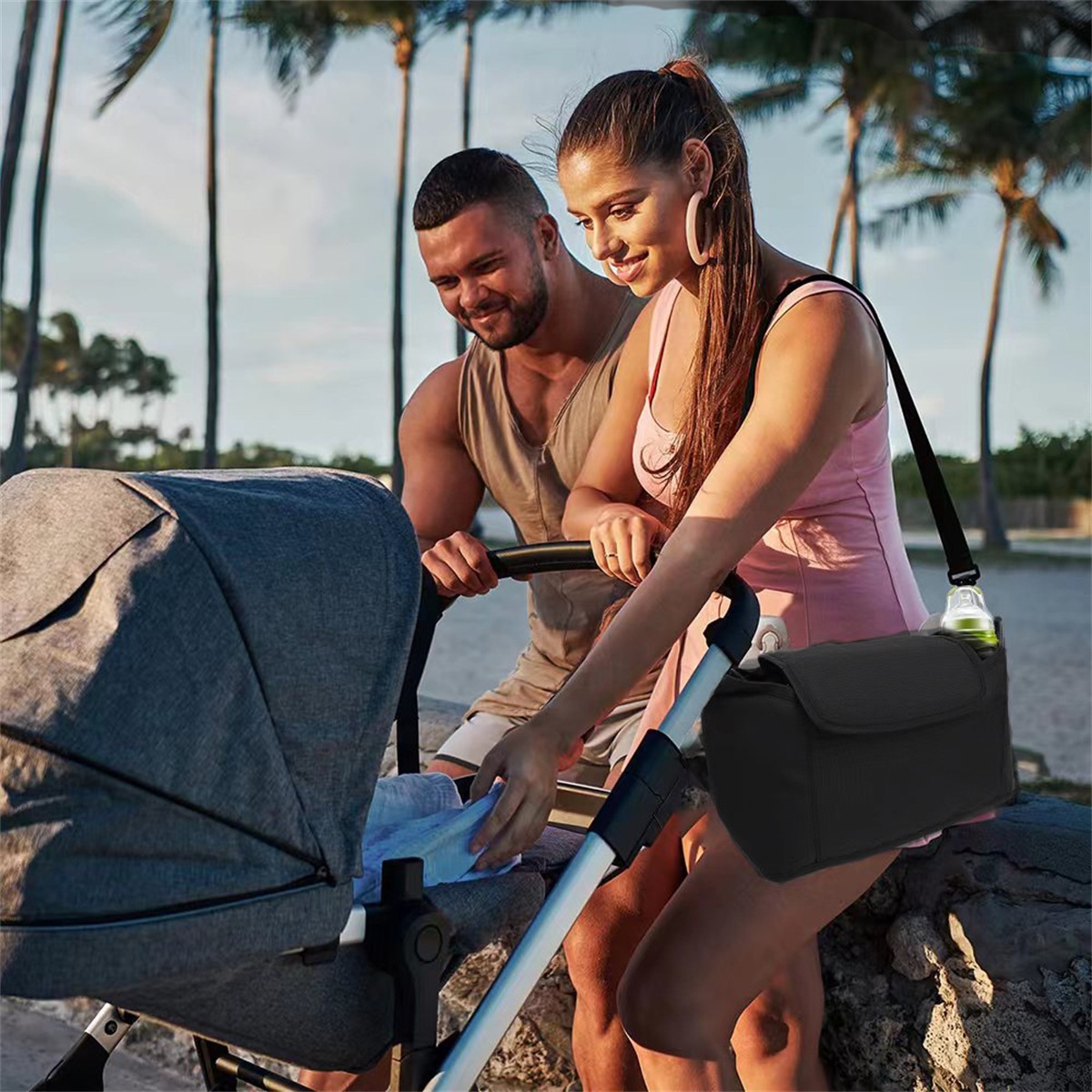 Bolsa organizadora universal para cochecito con correa para el hombro, organizador de pañales con múltiples bolsillos, portabotellas isotérmicos y bolsillo impermeable para pañuelos.