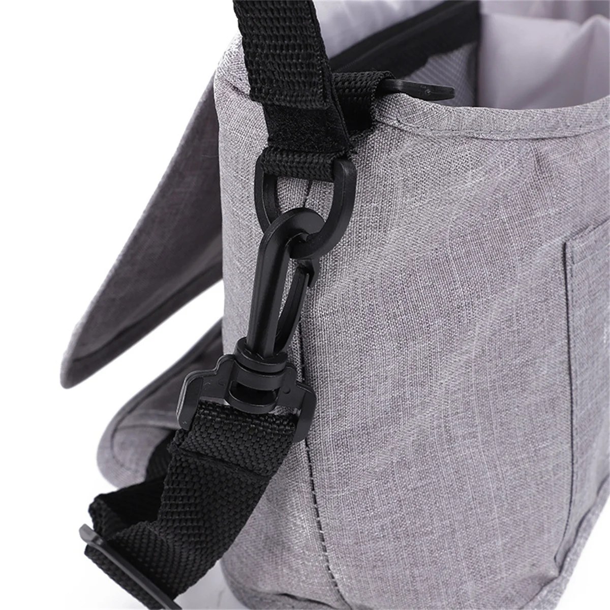Borsa organizer universale per passeggino con tracolla, contenitore multi-tasca per pannolini con portabottiglie termici e tasca impermeabile per fazzoletti.