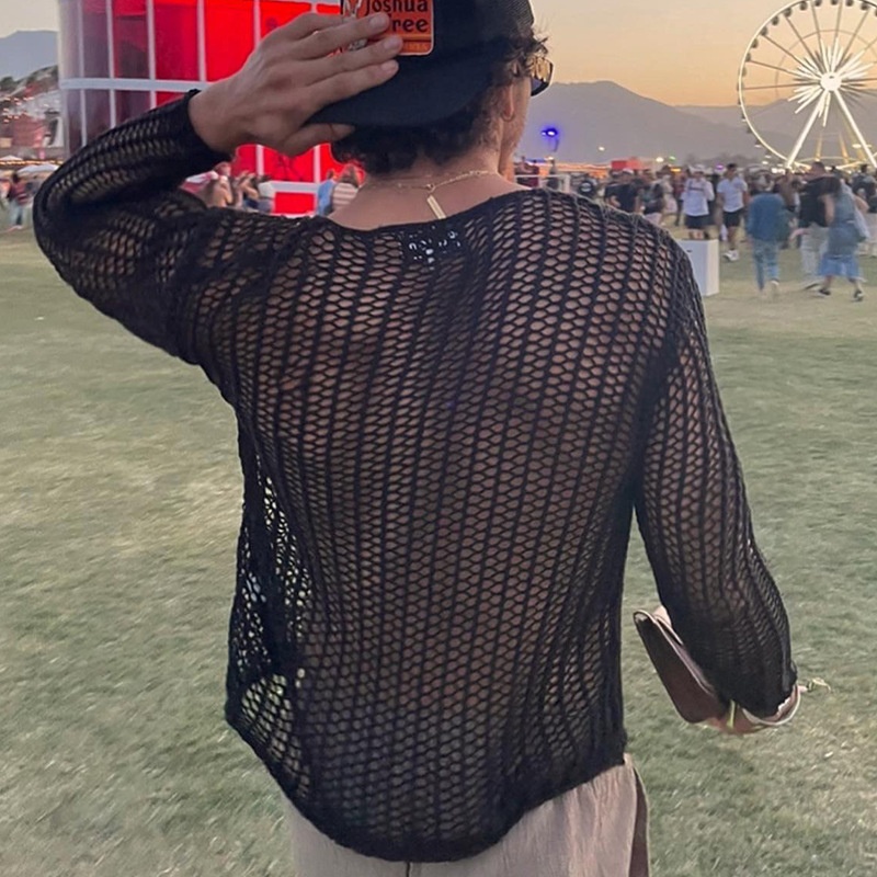 Pull décontracté en maille ajourée, coupe ample, idéal pour l'automne chez l'homme.