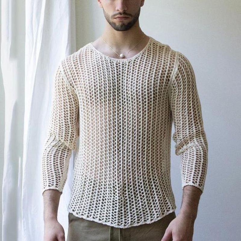 Pull décontracté en maille ajourée, coupe ample, idéal pour l'automne chez l'homme.
